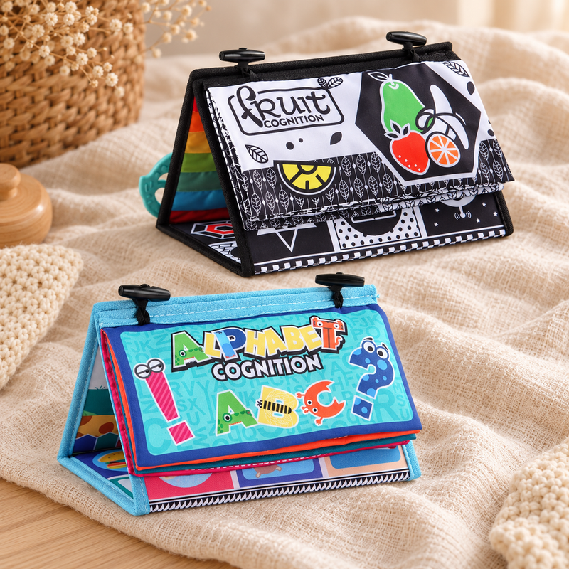 Baby sensory cloth books with mirror and teether on a warm neutral nursery backdrop
