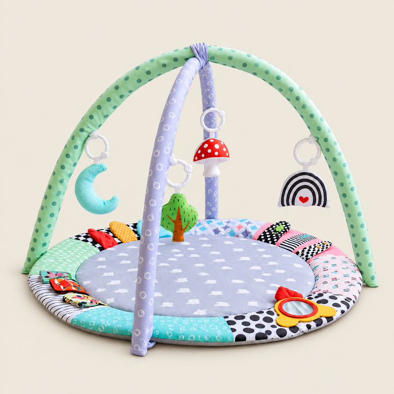 Colorful Round Baby Activity Gym & Sensory Play Mat on warm neutral background