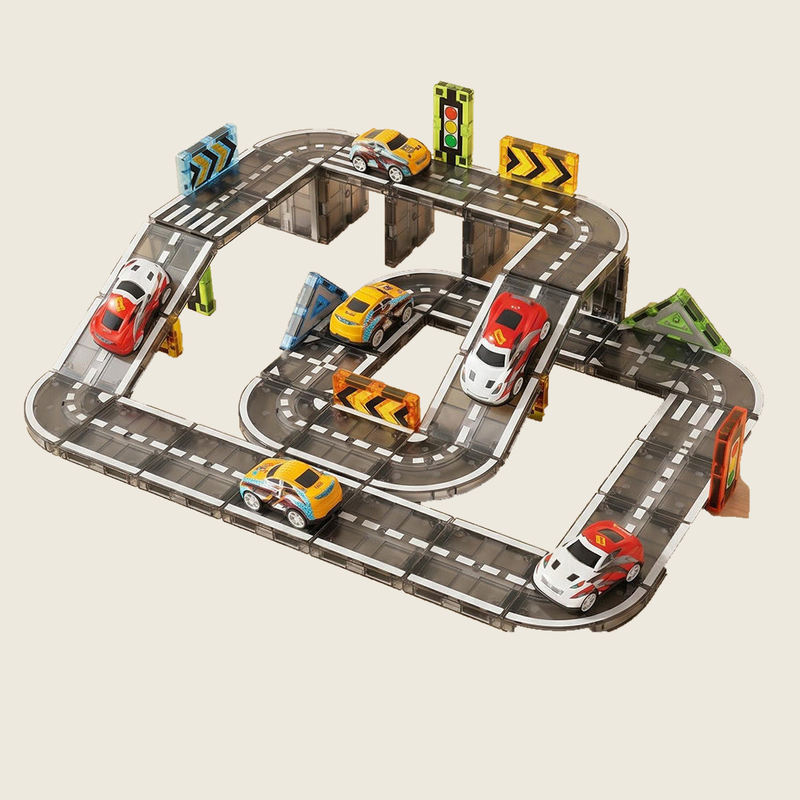 Magnetic city road building set arranged with cars on cream background