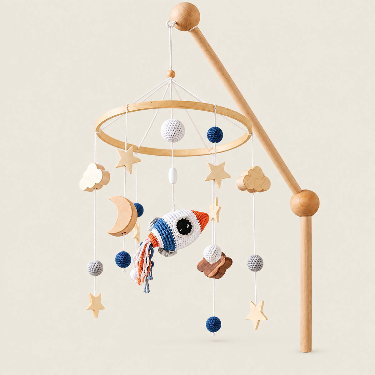 Nordic Style Wooden & Crochet Nursery Hanging Mobile on warm neutral background