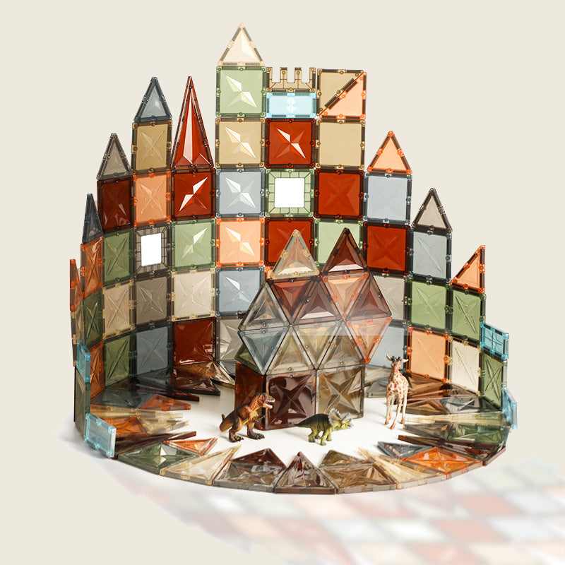 Colorful magnetic tile building set on warm ivory background