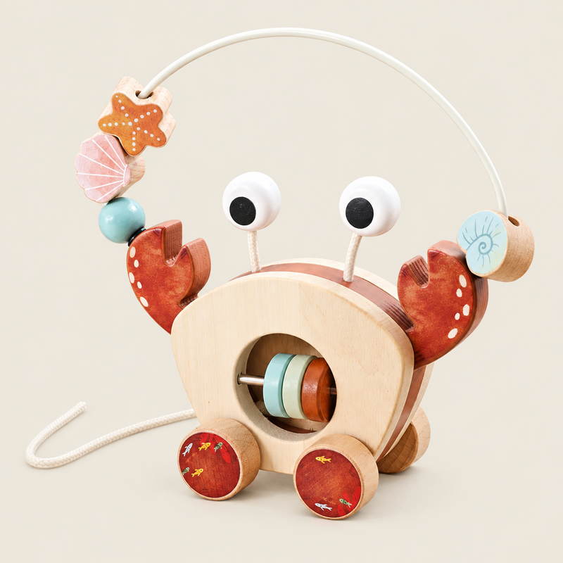 Wooden Crab Pull-Along Bead Maze Toy on warm neutral background